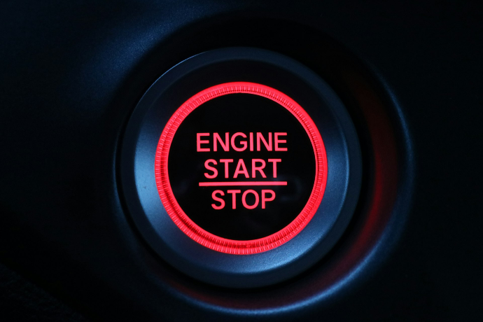 a close up of a button on a car engine